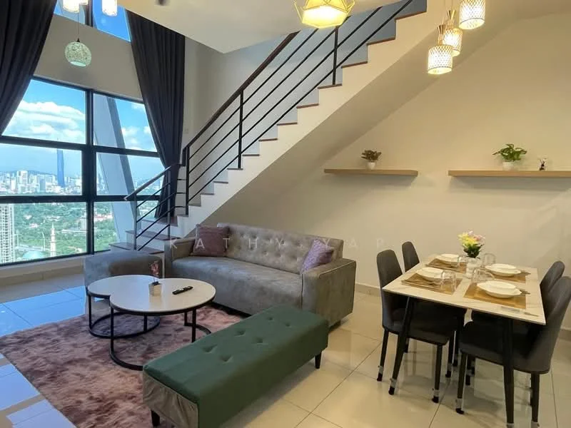 Living features: grey fabric sofa, round coffee table, green upholstered ottoman, area rug with geometric pattern, floor-to-ceiling windows, city skyline view, pendant lighting, recessed downlights, decorative wall shelf, dining table with 6 chairs, flower vase on dining table; style: modern; view: city.
