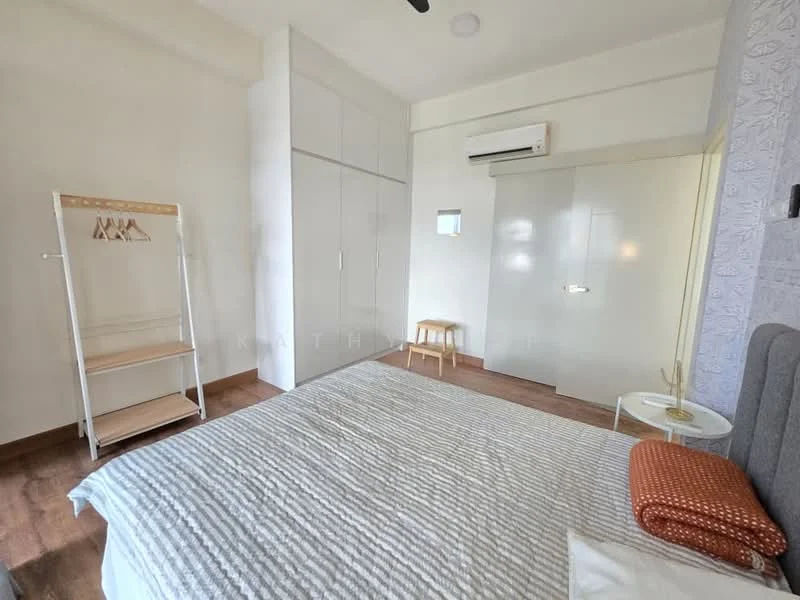 Bedroom features: queen-size bed with grey upholstered headboard, white bedding with textured pattern, wooden flooring, built-in wardrobe with sliding doors, wall-mounted air conditioning unit, mirror on wardrobe door, small wooden stool, white side table, decorative orange cushion, hanging rack for clothes, recessed ceiling light; style: modern.