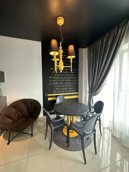 Dining features: round dining table with black surface, 4 dining chairs with grey upholstery, brown fabric accent chair, chandelier with yellow accents, black ceiling, curtains in grey fabric, decorative wall with text, white tiled flooring, area rug in circular shape; style: modern.