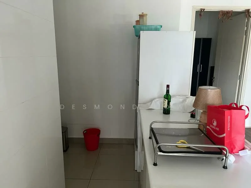 Kitchen features: white tiled walls, light grey floor tiles, stainless-steel fridge, white countertop, kitchen island, red plastic bin, lampshade, bottle on countertop, plastic basket, red shopping bag; style: modern.