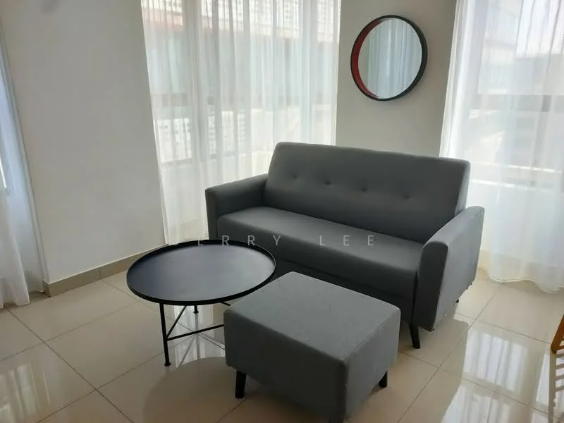 Living features: grey fabric sofa, round black coffee table, grey ottoman, white walls, large windows with sheer curtains, glossy tile flooring, decorative round mirror on wall, natural light from windows; style: modern.