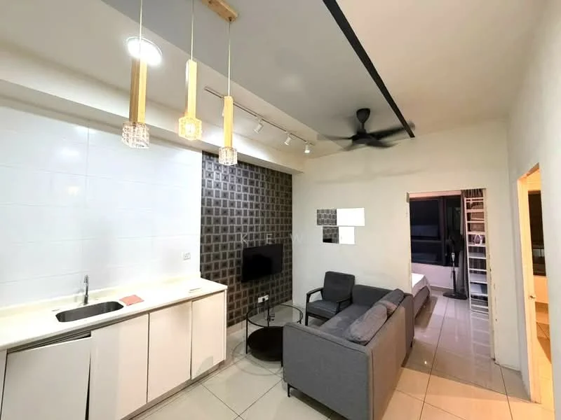 Living features: grey fabric sofa, coffee table, wall-mounted TV, pendant lighting with three fixtures, 5-blade ceiling fan, white tiled flooring, white painted walls, kitchenette with white cabinetry, single-bowl stainless-steel sink, black accent wall with square pattern, recessed LED downlights; style: modern.