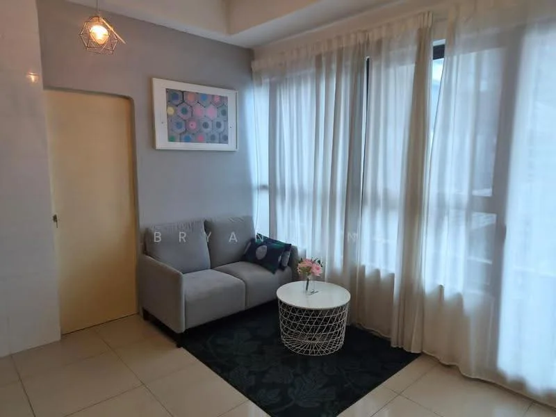 Living features: grey fabric 2-seater sofa, round white coffee table, black area rug with floral pattern, floor-to-ceiling windows, sheer white curtains, framed artwork on wall, light fixture with geometric design, cream painted walls, tile flooring; style: modern.