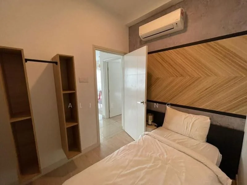 Bedroom features: single bed with white bedding, wooden headboard with geometric design, wall-mounted air conditioning unit, light-colored wooden flooring, white painted walls, open shelving unit, door leading to another room, natural light from door, decorative wall paneling; style: modern.
