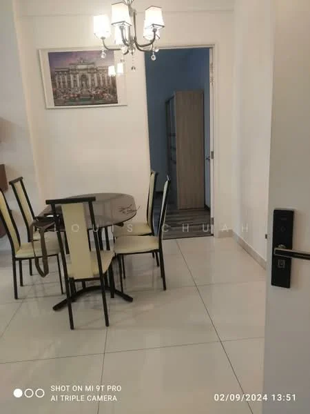 Dining features: round dining table, 4 upholstered dining chairs in cream, chandelier with multiple bulbs, white painted walls, tile flooring, framed artwork on wall, doorway leading to another room, light switch on wall; style: modern. Room features: light blue wall, wooden cabinet, doorway.