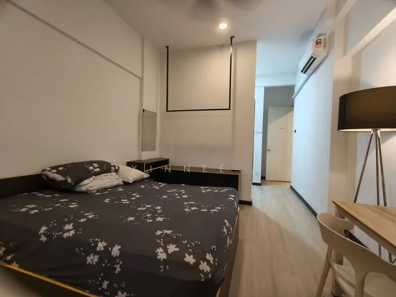 Bedroom features: queen-size bed with floral bedding, wooden bed frame, built-in wardrobe, mirror on wall, ceiling fan, laminate flooring, white painted walls, desk with chair, table lamp, air conditioning unit; style: modern.