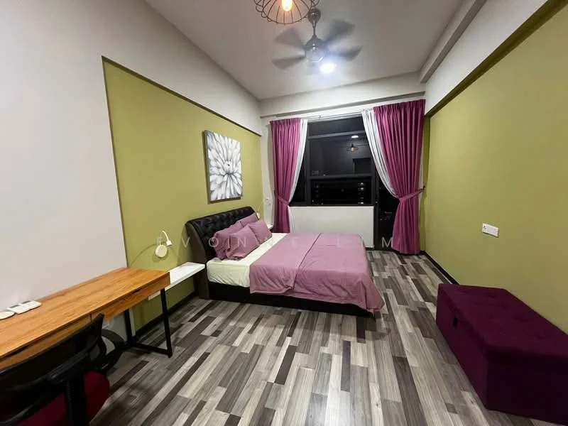 Bedroom features: queen-size bed with purple bedding, wooden flooring, green painted walls, white painted walls, ceiling fan with light, window with sheer curtains, desk with wooden surface and black chair, framed artwork on wall, purple ottoman, wall-mounted electrical outlet; style: modern; view: city.
