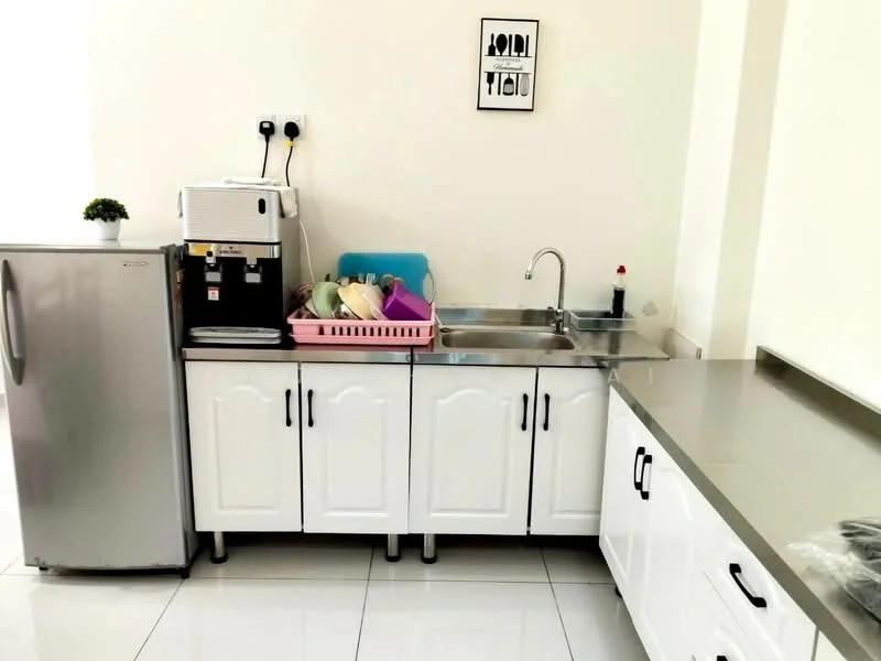 Kitchen features: stainless-steel fridge, single-bowl stainless-steel sink, chrome pull-down faucet, white shaker cabinets, stainless-steel countertop, dish rack, plastic storage containers, decorative plant on countertop, wall-mounted artwork, white tiled walls, white tiled flooring; style: modern.