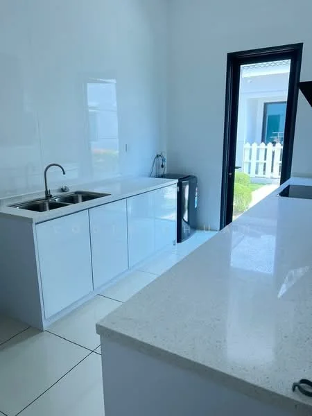 Kitchen features: white glossy cabinetry, double-bowl stainless-steel sink, chrome pull-down faucet, white quartz countertop, ceramic tile flooring, built-in refrigerator, open layout, window with view to outdoor area, sliding door leading to outdoor space; style: modern; view: garden.