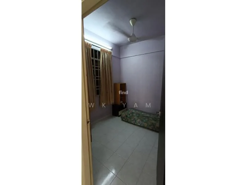 Bedroom features: light purple painted walls, white ceiling, ceiling fan, window with sheer curtains, tiled flooring, single bed with floral bedding, wooden bedside table, built-in wardrobe.