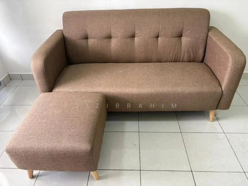 Living features: 3-seater fabric sofa in brown, ottoman, light wood legs, grey tiled flooring, white painted walls; style: modern.