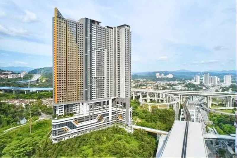 Exterior type: high-rise condominium; features: glass curtain wall, exposed concrete facade, recessed balconies, vertical fins, surrounded by greenery, urban context with highways, multiple storeys, modern architectural design; style: modern.