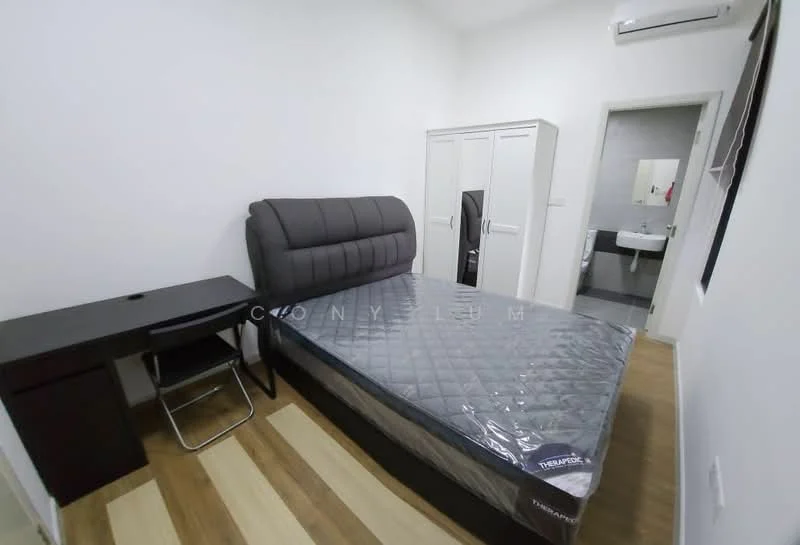 Bedroom features: queen-size bed with grey upholstered headboard, mattress with plastic cover, wooden flooring, white painted walls, built-in wardrobe with sliding doors, study desk with chair, air conditioning unit on wall, window with no visible treatment; style: modern. Bathroom features: sink with mirror, toilet, white tiled walls, grey tiled flooring.