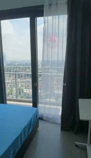 Bedroom features: queen-size bed with blue bedding, floor-to-ceiling windows, sheer white curtains, dark grey curtains, light grey walls, laminate flooring, small white bedside table, city view from window; style: modern; view: city.