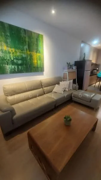 Living features: 3-seater fabric sofa in beige, wood coffee table, abstract artwork on wall with green and yellow tones, laminate flooring, recessed downlights, decorative plant on coffee table, open shelving unit, kitchen area visible in background; style: modern.