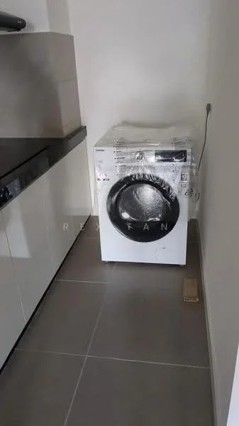 Laundry features: front-load washing machine wrapped in plastic, grey tile flooring, white cabinetry, black countertop, neutral wall colour; style: modern.