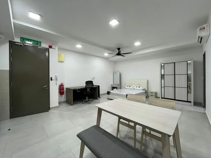 Room features: grey tiled flooring, white painted walls, recessed downlights, 5-blade ceiling fan, double bed with white bedding, wooden desk with chair, mirror-fronted wardrobe, dining table with 4 chairs, fire extinguisher on wall, air conditioning unit; style: modern.