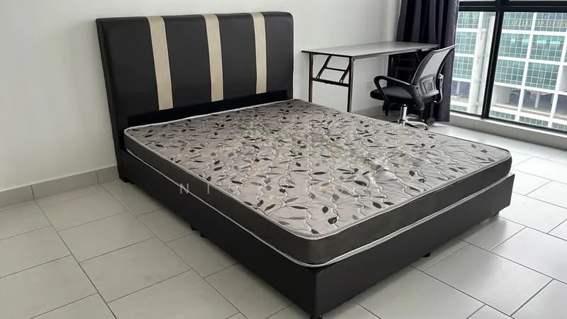 Bedroom features: king-size bed, upholstered headboard with vertical stripes, mattress with floral pattern, tile flooring, desk with chair, large window with city view, curtains, neutral wall color; style: modern; view: city.