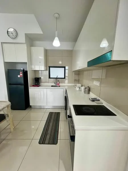 Kitchen features: white cabinetry, black countertop, built-in electric stove, stainless-steel sink, chrome pull-down faucet, black fridge, microwave, wall-mounted TV, pendant lighting, tile backsplash, ceramic tile flooring, kitchen mat, coffee maker; style: modern.