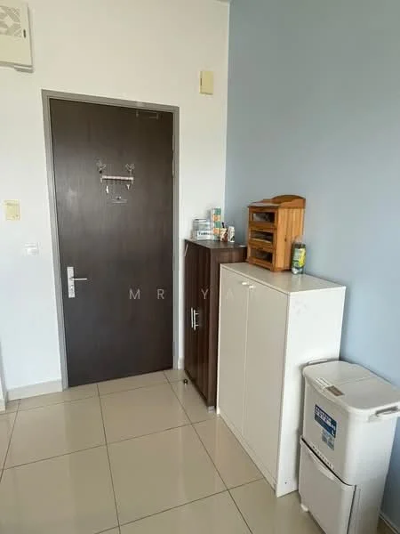 Room features: white walls, light blue accent wall, glossy tile flooring, wooden door with silver handle, white cabinet, brown wooden storage unit, small refrigerator, wall-mounted air conditioning unit, door mat, shelves with various items; style: modern.