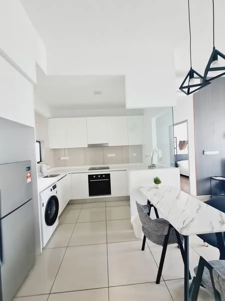 Kitchen features: white cabinetry, marble countertop, stainless-steel fridge, built-in oven, 4-burner gas hob, washing machine, ceramic tile flooring, recessed downlights, open shelving, dining table with marble top, upholstered dining chairs, window with natural light; style: modern.