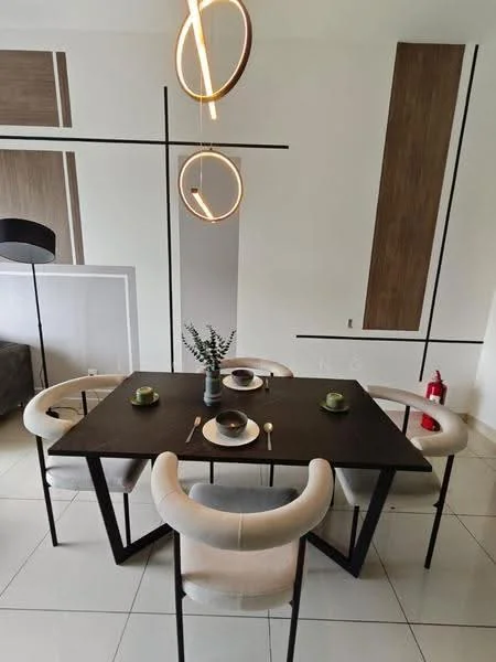 Dining features: black dining table, 4 upholstered dining chairs in cream, modern pendant light fixture, decorative vase with greenery, white ceramic plates, cutlery, light grey walls, wood accent wall, tile flooring; style: modern.