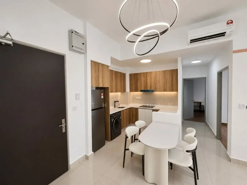 Kitchen features: white painted walls, light grey tile flooring, wood cabinetry, stainless-steel fridge, built-in oven, washing machine, white countertop, recessed LED downlights, round pendant light fixture, 4-seater dining table with white top, upholstered dining chairs, wall-mounted split AC; style: modern.