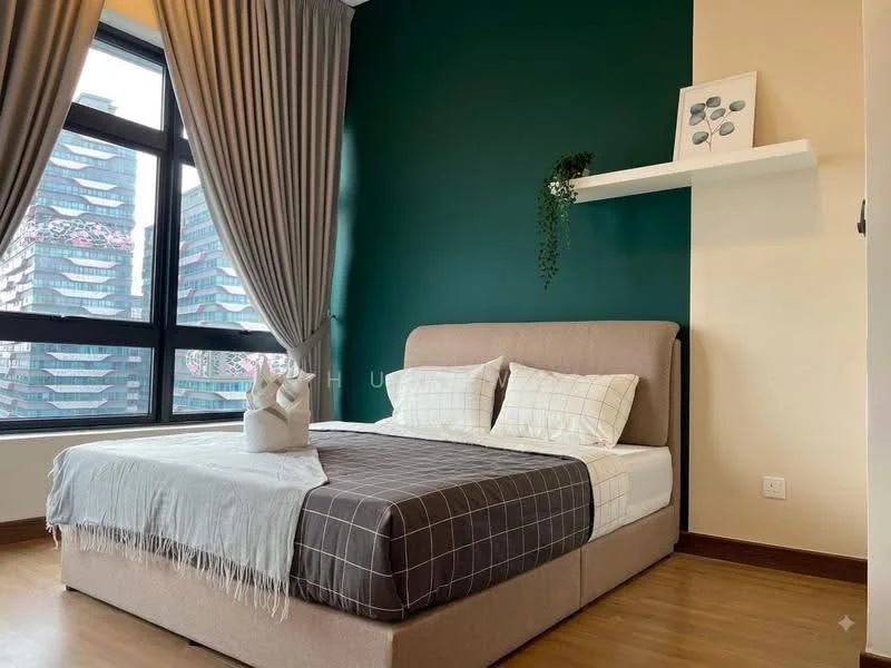 Bedroom features: king-size bed, upholstered headboard, plaid bedspread, decorative throw blanket, floor-to-ceiling windows, curtains in grey, green accent wall, light beige wall, shelf with decorative plant, wooden flooring; style: modern; view: city.