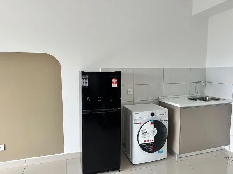 Kitchen features: black fridge, front-load washing machine, single-bowl stainless-steel sink, chrome pull-down faucet, light grey cabinetry, white tiled backsplash, white walls, cream accent wall, ceramic tile flooring; style: modern.