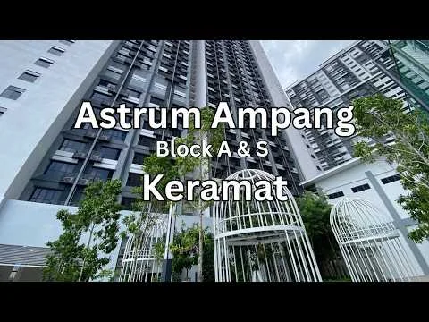 Exterior type: high-rise condominium; features: glass curtain wall, white painted facade, recessed balconies, landscaped garden area, manicured lawn, surrounded by greenery, entrance gate with decorative structure; style: modern.