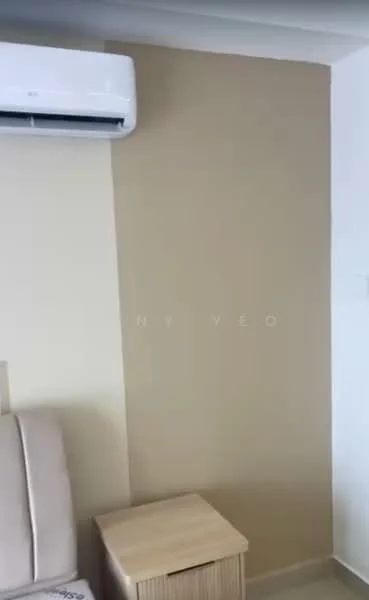 Room features: cream painted walls, wall-mounted split AC, light wood bedside table, upholstered sofa.