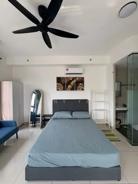 Bedroom features: king-size bed with grey upholstered headboard, light blue bed linens, 5-blade ceiling fan, wall-mounted split AC unit, floor-to-ceiling mirror, built-in wardrobe with wooden finish, blue fabric sofa, white shelving unit, tile flooring, decorative artwork on wall, green area rug; style: modern.