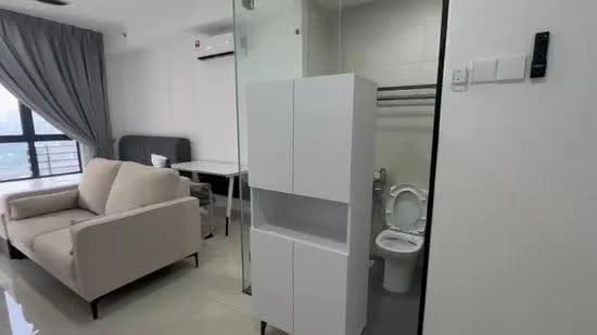 Living features: beige fabric sofa, white walls, large window with city view, grey curtains, dining table, white cabinetry, floor tiles, air conditioning unit; style: modern; view: city. Bathroom features: one-piece toilet, white tiled walls, floor tiles, sink with faucet, mirror, shower area; style: modern.