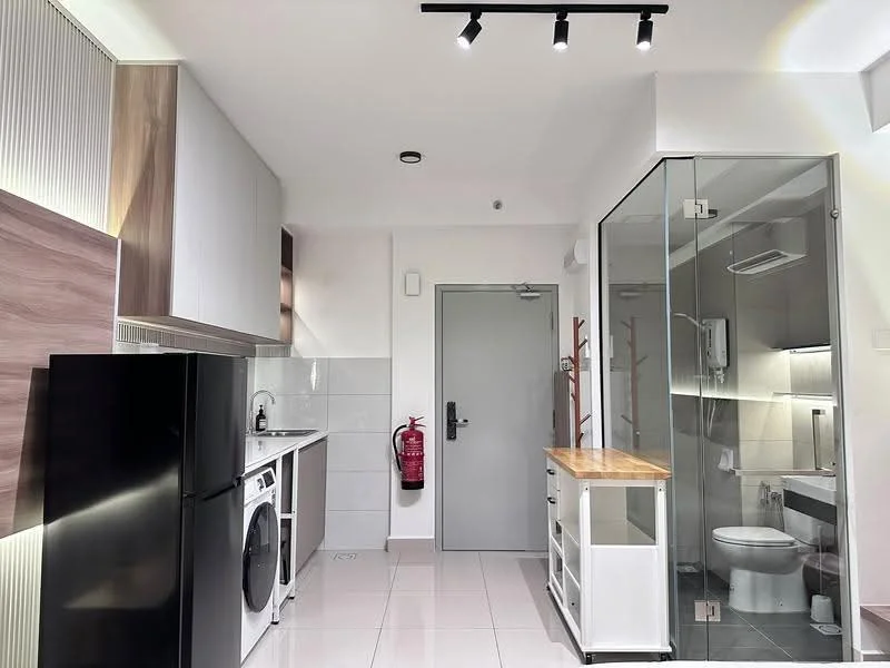 Laundry features: white cabinetry, wood countertop, black refrigerator, front-load washing machine, glass shower enclosure, toilet, sink, tile flooring, recessed LED downlights, fire extinguisher, white walls, mirror, wall-mounted shower head; style: modern.