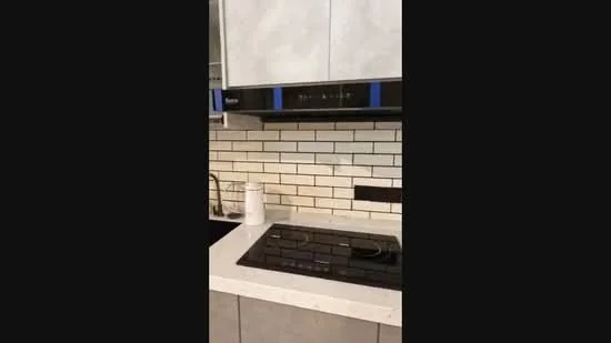 Kitchen features: white cabinetry with blue accents, stainless-steel range hood, black gas cooktop with five burners, white quartz countertop, white subway tile backsplash, built-in oven, kitchen utensils holder, modern faucet; style: modern.