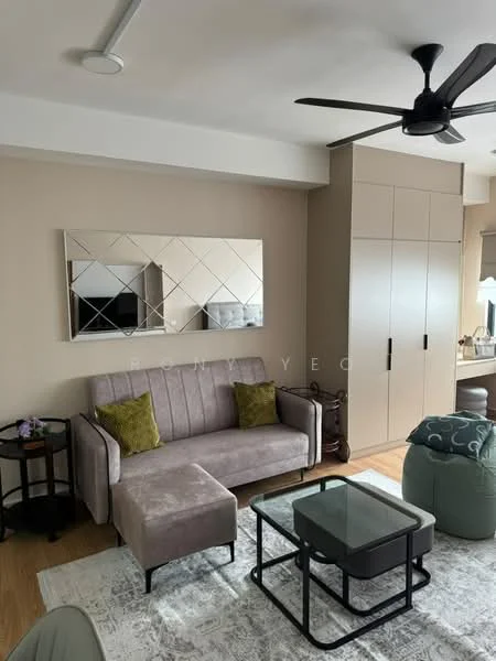 Living features: 3-seater fabric sofa in grey, accent chair in green, glass coffee table, area rug with geometric pattern, wall-mounted mirror, built-in wardrobe with sliding doors, ceiling fan with light, wooden flooring, decorative cushions, TV console, decorative items on shelves; style: modern.