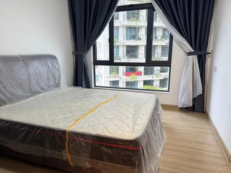 Bedroom features: queen-size bed, mattress covered in plastic, floor-to-ceiling window, blackout curtains, sheer curtains, wooden flooring, white painted walls, decorative window trim; style: modern; view: garden.