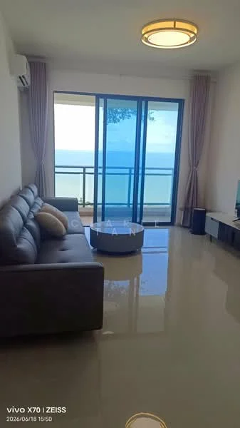Living features: 3-seater fabric sofa in grey, coffee table, TV console, wall-mounted TV, floor-to-ceiling windows, sliding glass door, curtains, 1 wall-mounted split AC, glossy tile flooring, ceiling light fixture; style: modern; view: sea.