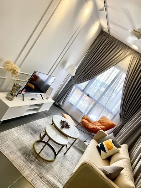 Living features: 3-seater fabric sofa in beige, orange accent chair, round coffee table with metal frame, TV on white media console, floor-to-ceiling windows, sheer curtains, dark grey curtains, decorative throw pillows, area rug with geometric pattern, ceiling fan with light, wall-mounted lighting, decorative vase with dried flowers; style: modern; view: city.