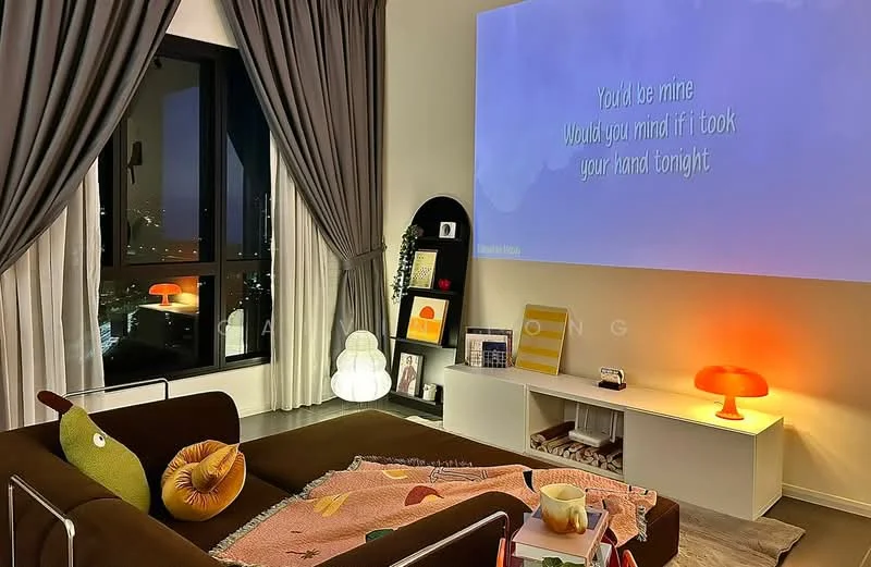 Living features: floor-to-ceiling windows, grey curtains, wall-mounted TV, white media console, decorative wall art, orange table lamp, green decorative pillow, brown fabric sofa, area rug, coffee table, projector screen, decorative items on shelves; style: modern; view: city.
