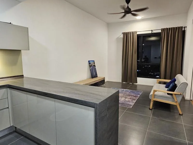 Living features: grey tile flooring, white painted walls, ceiling fan, floor-to-ceiling window, dark brown curtains, wooden coffee table, light-colored armchair, decorative area rug; style: modern; view: city. Kitchen features: grey stone countertop, glass-front cabinetry, built-in kitchen appliances, under-cabinet lighting; style: modern.