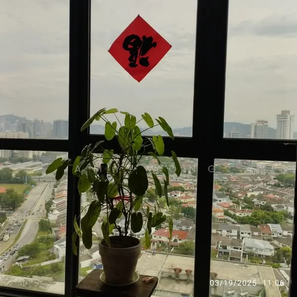 Room features: large floor-to-ceiling windows, city skyline view, decorative red wall hanging, potted plant on a stand, urban landscape visible outside; style: modern; view: city.