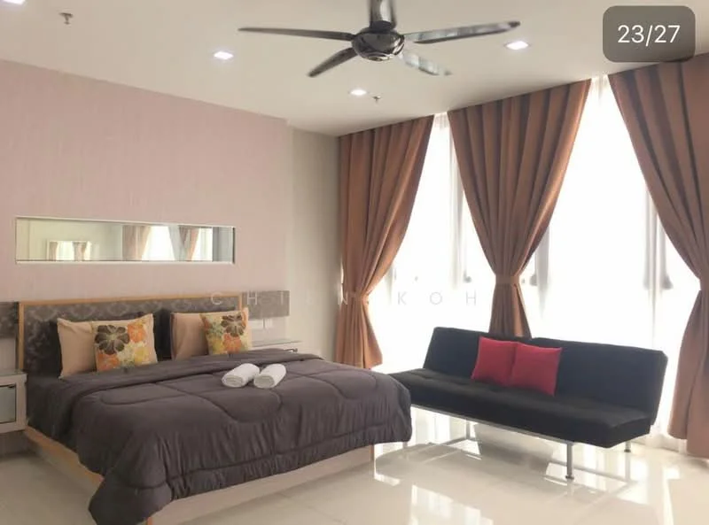 Bedroom features: king-size bed with grey bedding, upholstered headboard, decorative pillows, bedside table with mirror, sofa in black fabric, floor-to-ceiling windows, sheer curtains, dark brown curtains, recessed downlights, polished tile flooring; style: modern.