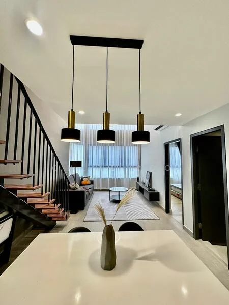 Dining features: white dining table, black dining chairs, 3-bulb pendant light fixture, decorative vase with dried plants, wooden flooring, open-plan layout, large windows with sheer curtains, wall-mounted TV, sofa in living area, staircase with wooden steps and black railing; style: modern; view: living.