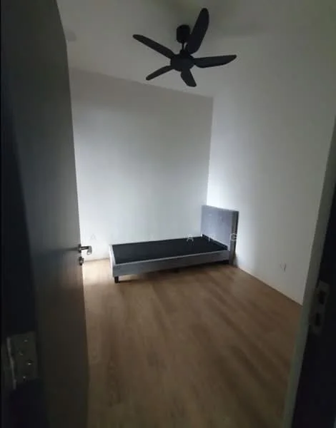 Room features: wooden flooring, white painted walls, ceiling fan, single bed frame, door, window, light source.