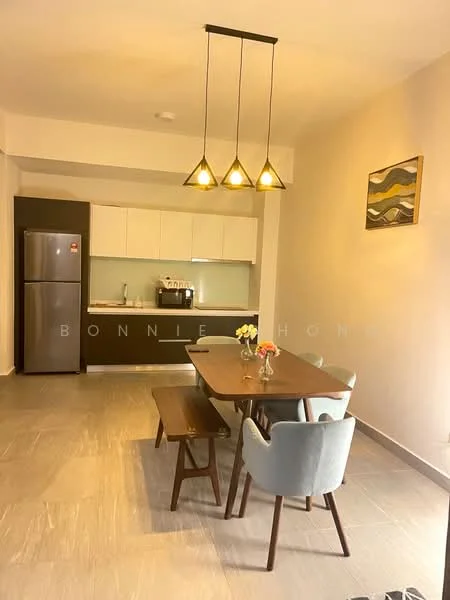 Dining features: wooden dining table, 4 upholstered dining chairs in grey, pendant light fixture with three bulbs, fridge in stainless steel, white cabinetry, grey countertop, kitchen sink, wall-mounted cabinets, decorative artwork on wall, grey tile flooring; style: modern.