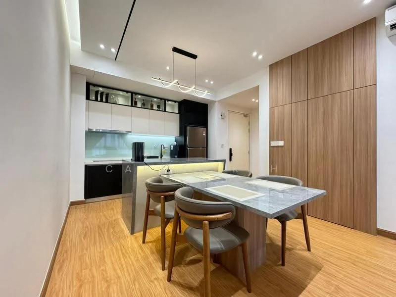 Dining features: 6-seater dining table with marble top, upholstered dining chairs, wood cabinetry, white upper cabinets, black lower cabinets, built-in refrigerator, recessed downlights, pendant light above table, wooden accent wall, laminate flooring, open kitchen layout; style: modern.