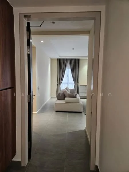 Room features: grey tiled flooring, white painted walls, floor-to-ceiling window with sheer curtains, sofa in light color, decorative wall with wooden cabinetry, recessed ceiling lights, curtains in neutral color; style: modern.