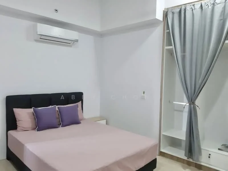 Bedroom features: queen-size bed with black upholstered headboard, pink bedspread, two purple decorative pillows, wall-mounted air conditioning unit, white painted walls, light wood flooring, built-in wardrobe with open shelving, grey curtain; style: modern.