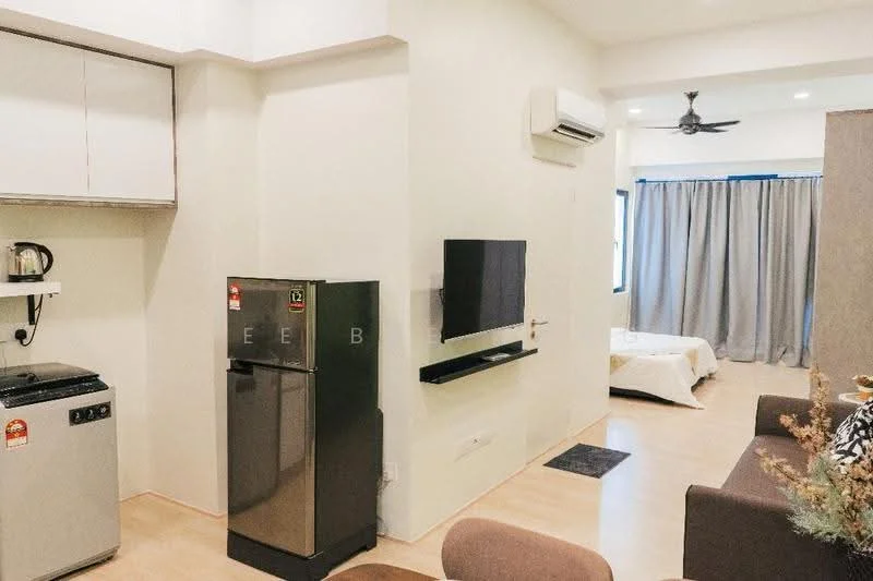 Living features: light wood flooring, white painted walls, ceiling fan, wall-mounted TV, sofa in brown, coffee table, curtains in grey, air conditioning unit, open layout to kitchen, refrigerator in stainless steel, kitchenette with countertop, microwave, kettle; style: modern.